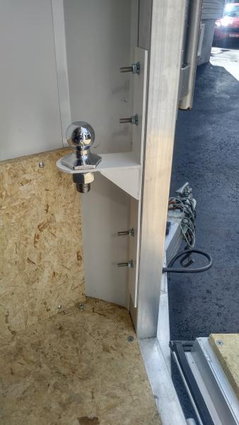 Custom bracket fabricated to hold 1 7/8 ball.