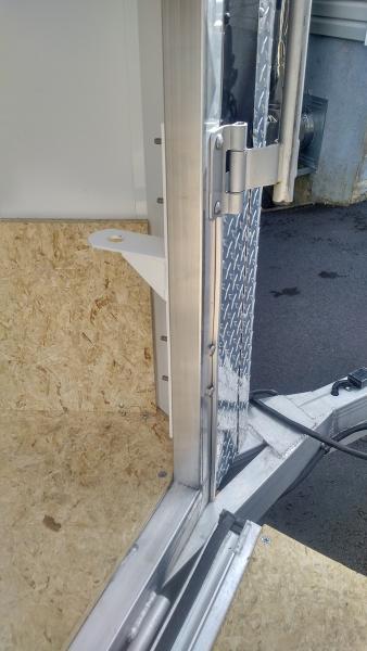 Custom bracket fabricated to hold 1 7/8 ball.