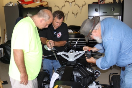 Cutting down the old handle bars in preparation for the riser kit!
