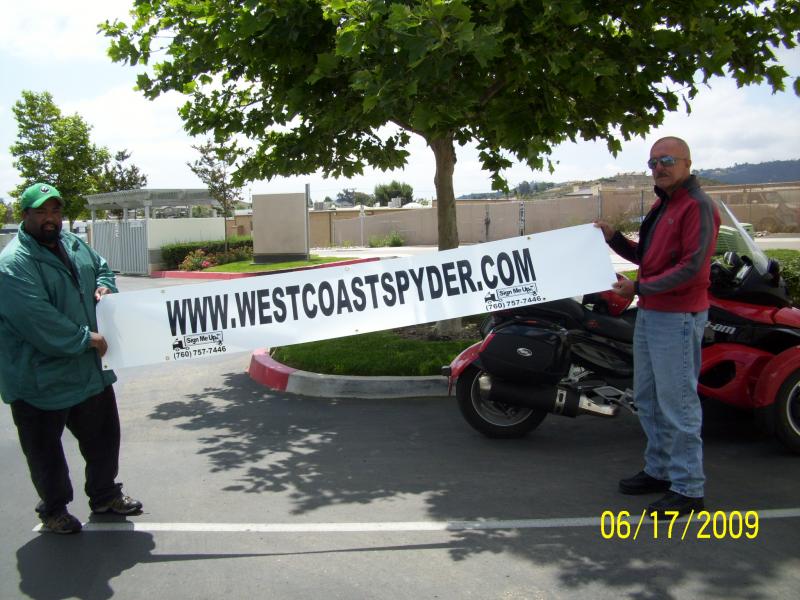 Dudley accepting the banner, San Marcos, CA