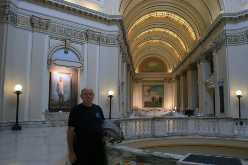 Ed in OK Capitol (painting of Jim Thorpe in background)