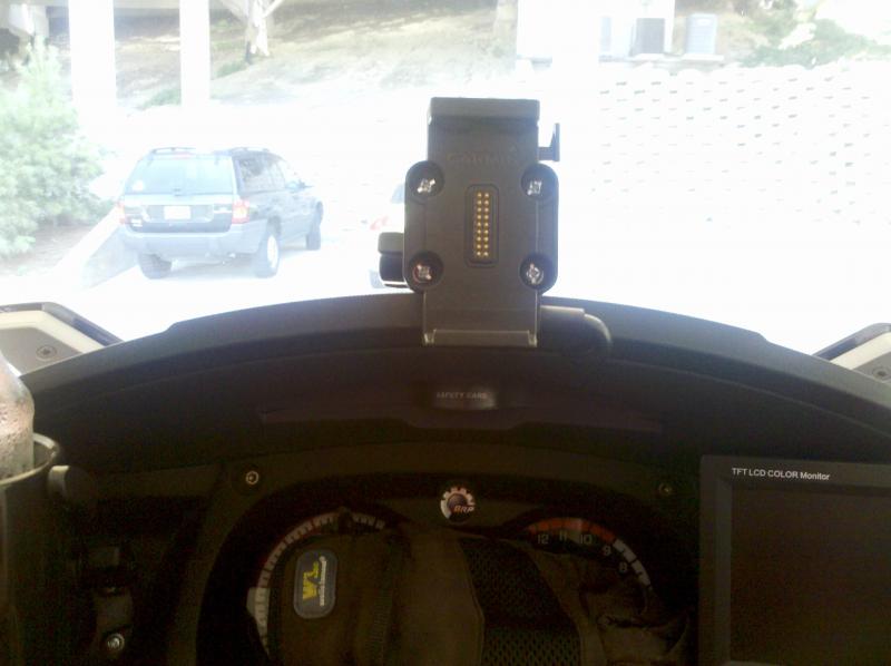 Empty Garmin cradle on top of dash