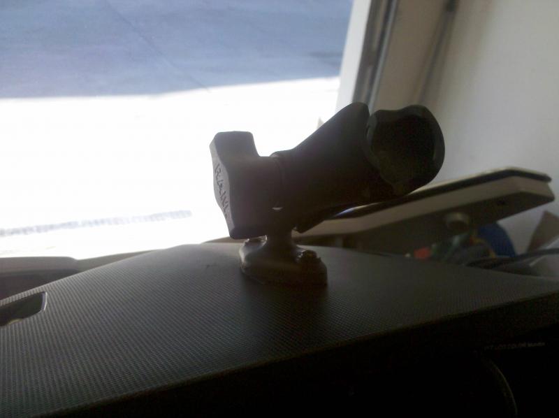 Empty Ram Mount attached to top of dash