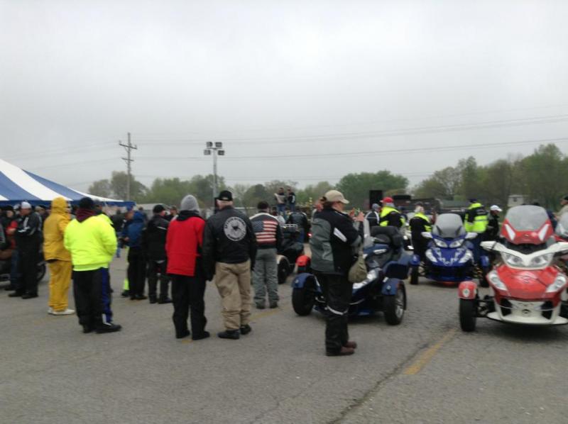 Everyone watching the trophy presentation for drag racing and bike constest