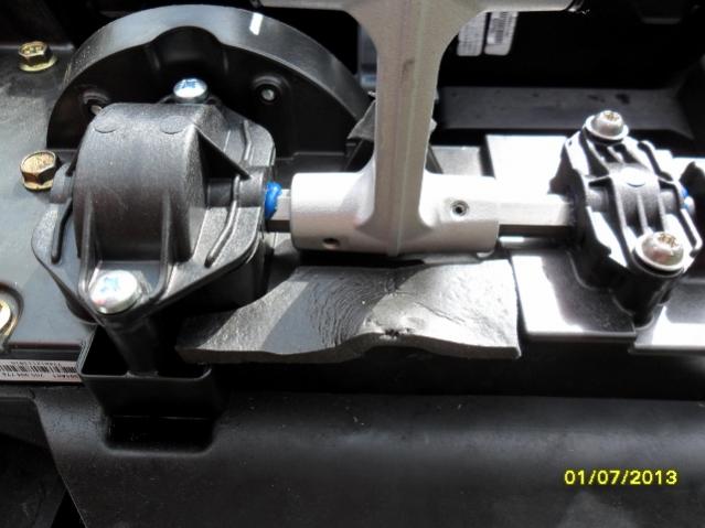 Foam rubber strip 3mm thick under the middle bracket  used as  anti-vibration dampener when the Windshield is in the down position