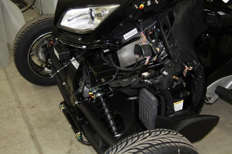 Front side panels, and panel under headlight assembly removed so nose assembly could be attached.