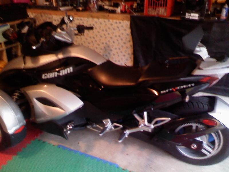 Garaged.  My wife cut down my work bench so Spydie would fit!