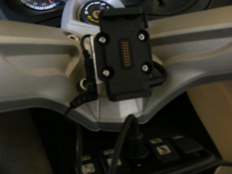 Garmin Mount with mic connection mounted on an external piece of metal.