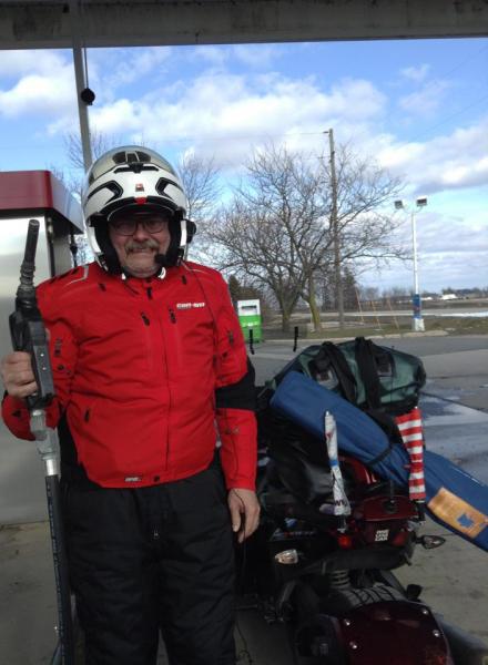 Gassing up on the way to Spyderfest...still in our winter gear!