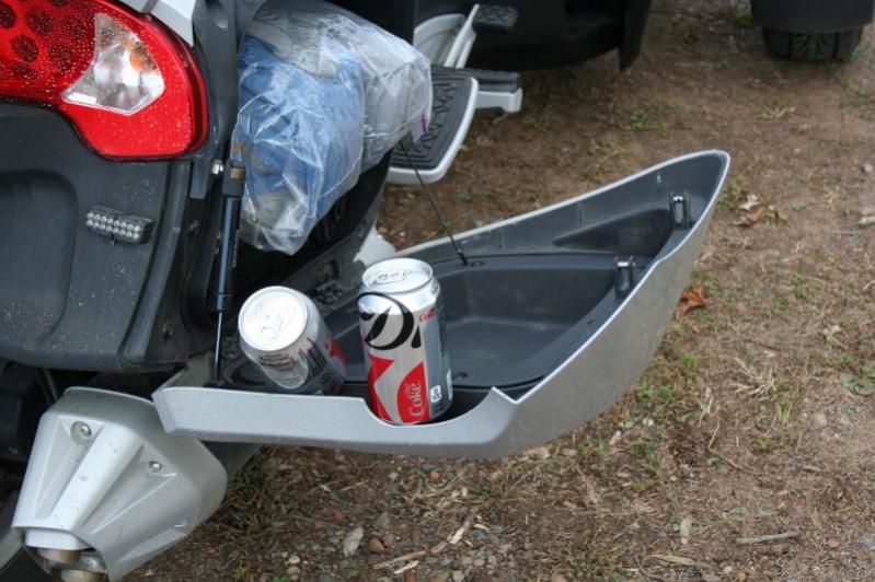 Gene's proof to Ann, this soda didn't fall out of his saddle bag!