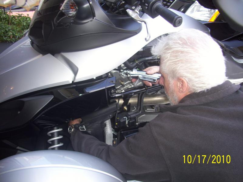 Greasing the suspension. This requires a right angle end on the gun, and also an extra long hose helps.