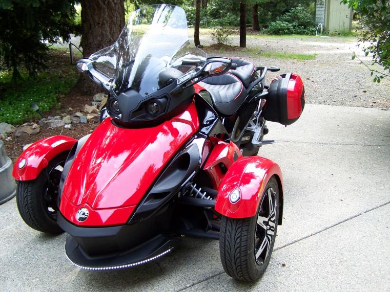 Having more fun that a barrel of Spyders personalizing the RS.  So far we've added Ultra-touring windshield; Givi Hardbags; Corbin seat (not heated); 