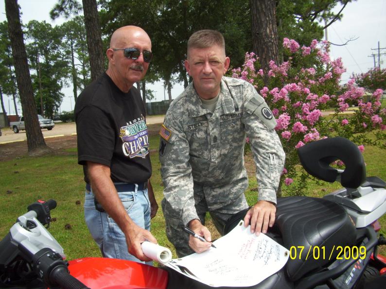 Homer & Dudley with the banner