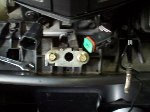 Inside the hood catch (if you zoom real close) you can see a seat for a spring. So...