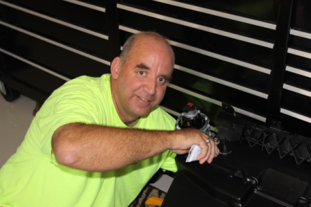 Larry putting the seal around the 12volt accessory hole.