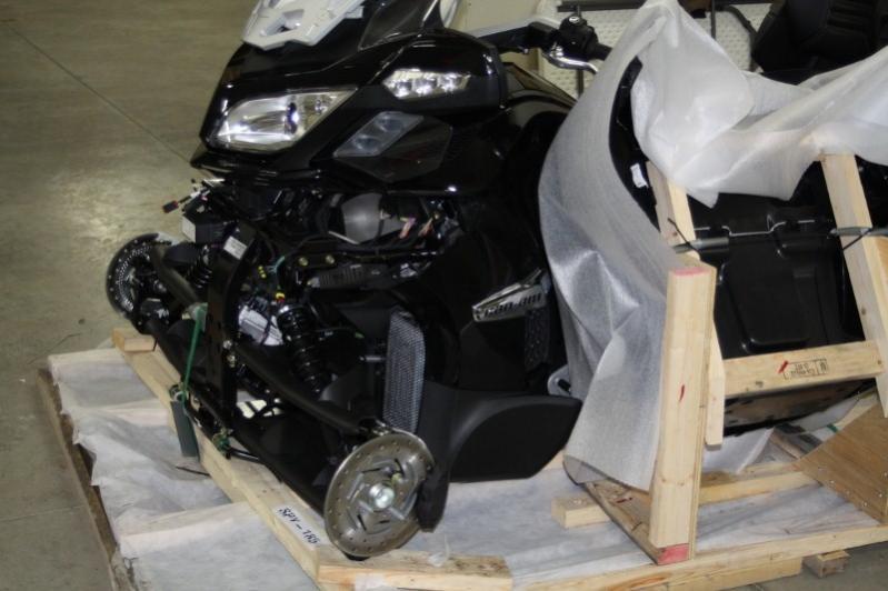 Left front showing frame resting on crate base.