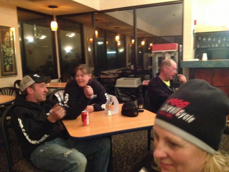 Len, Tina, and Paula chatting at the motel.