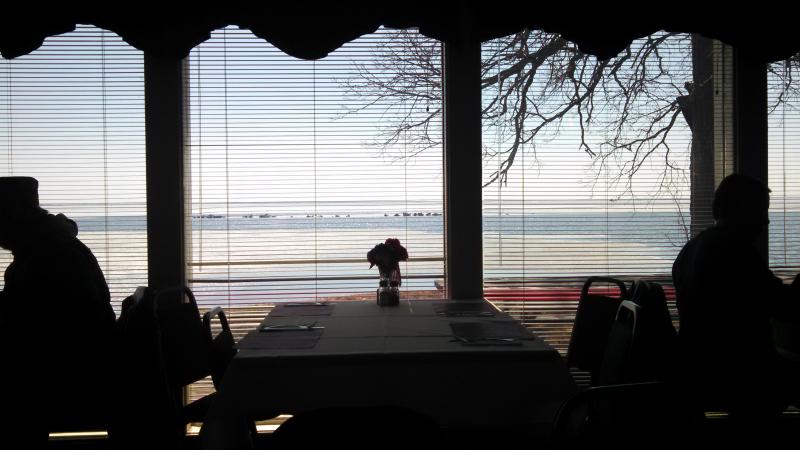 Looking at ice and open water on Lake Mille Lacs from the Flagship Inn.