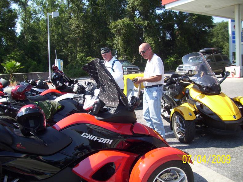 Looking.  Dudley about to adjust the parking brake.