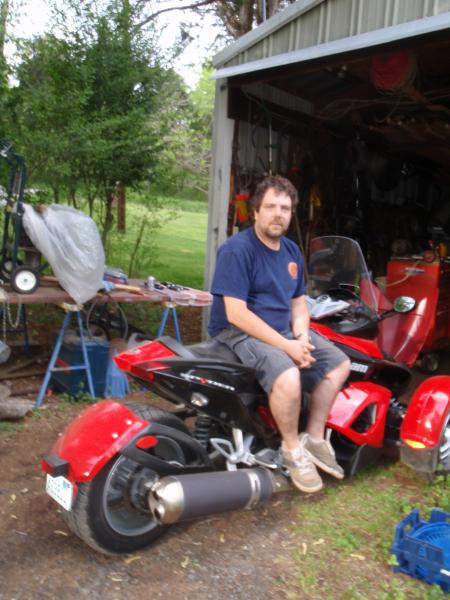 Me and my 08 SM5 getting ready to put on Kewl Metal Risers outside the shop