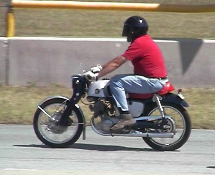 Me on my CB92R at Mid-Ohio 2002
The last time this bike saw this track was in 1968, when I crashed in practice.