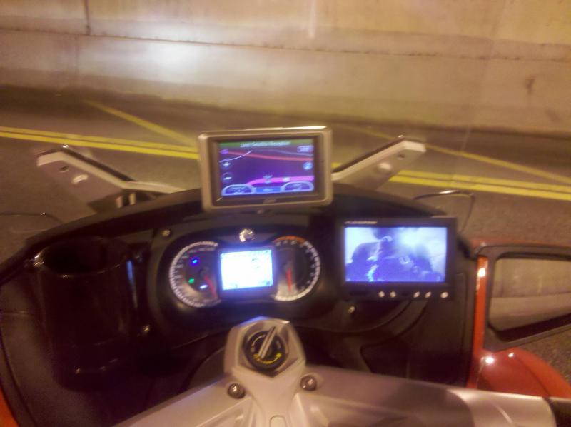 Mods Complete & in ACTION
Right side for Rear View Camera LCD
Left side for Much Desired Cup-Holder
Ram Mount to top dash for Garmin Zumo 665