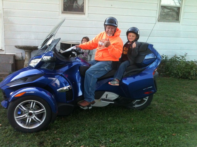 My Grandson Garrett and I. He got the first ride. He didn't want to stop......neither did I. The smile on his face.......priceless.