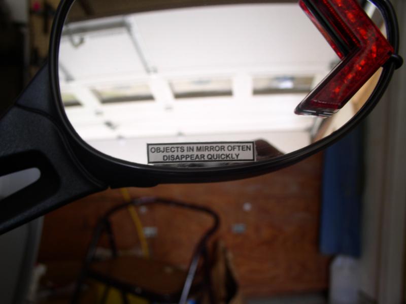 My least expensive mods.  The LED turn signal from PEPBoys $10. The mirror lable $1.