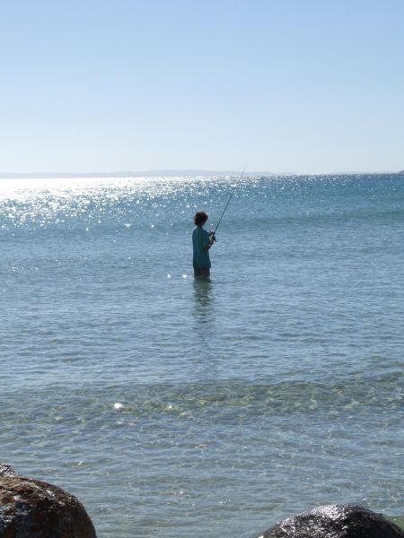 My son doing some fishing, 
Waterhouse Point, Northern Tasmania.