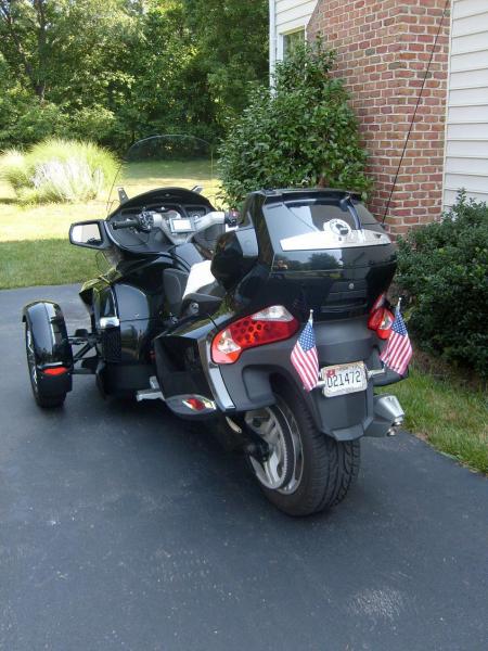 My Spyder - Oblique Rear.  The white thingy on the seat is my Alaska Leather sheepskin cover.  Fits well.  The regular straps worked around the sides 