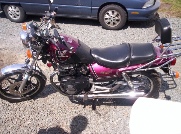 My very first (legal) street bike. This is a 1984 450 Honda Nighthawk. The side of the tank was caved in & it was faded horribly, so, it became this..