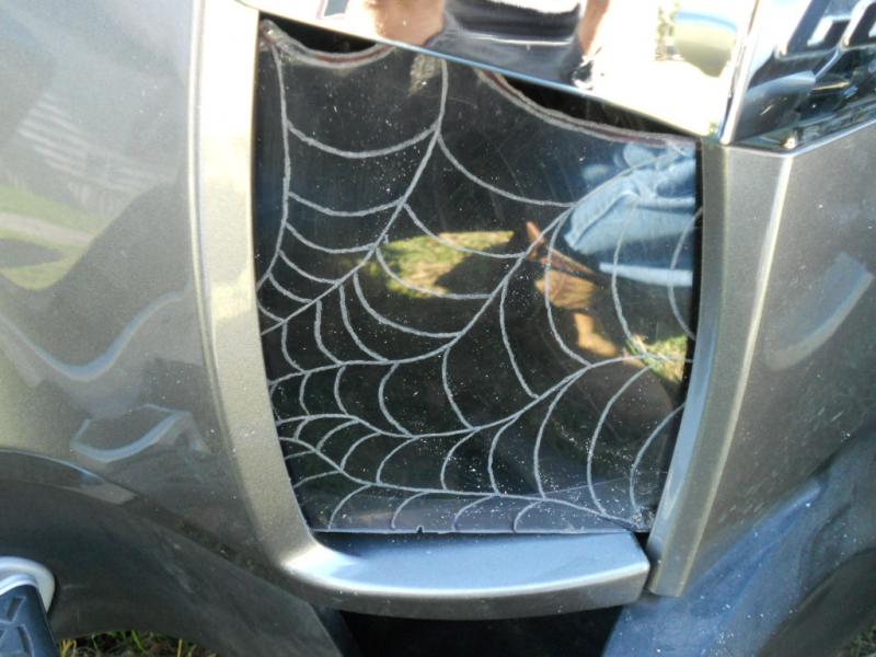 Needs to be cut along outside edge of web to seat right, Held in by panels, no screws and no complete panel removal, just pull top section back and sl