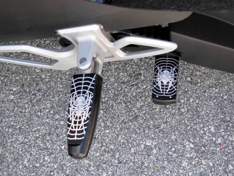 New foot pegs and extended parking brake adapter installed.