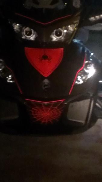 Night time Reflective 3m film from Wrap My Spyder W/ 1/4" reflective tape in the seams of the panels