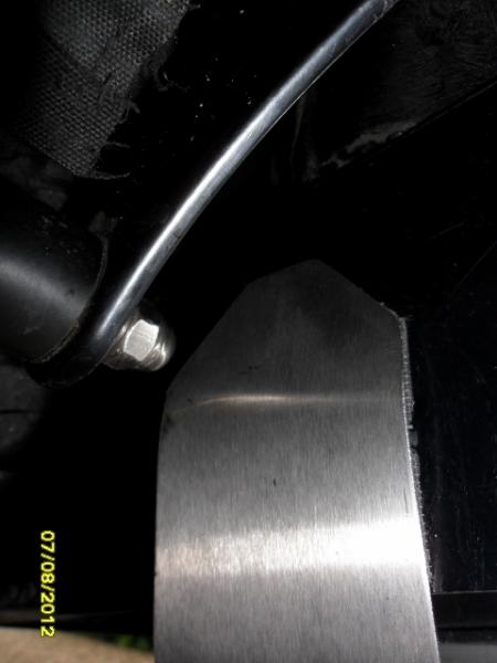 Original Spyderpops Belt Guard Bracket held in Place by my
Stainless Steel Bracket -  To keep it away from the Tyre 

Made by Eddie Sheppard 
Reading 