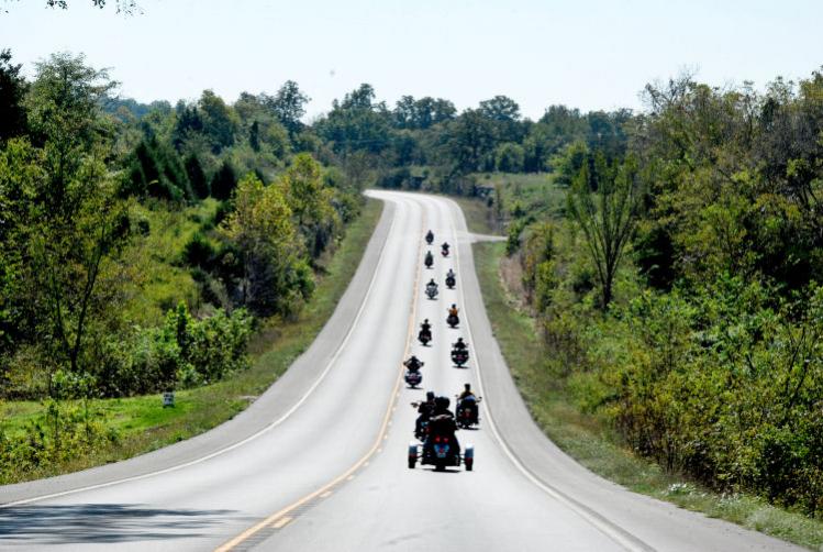 Our Caravan to the Rally... Somebody has to keep an eye on these guys.  11 bikes and a Spyder.
