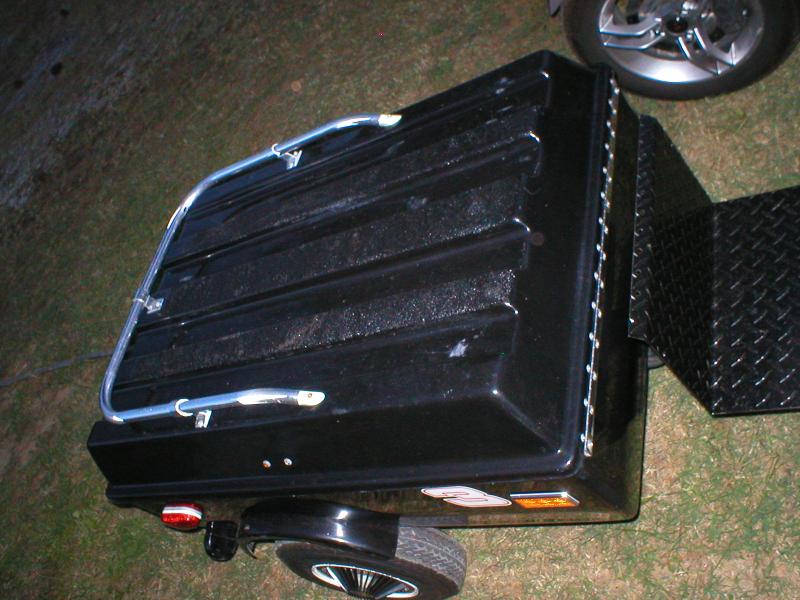 Our little trailer, see the Roll on bed liner on the three rails
