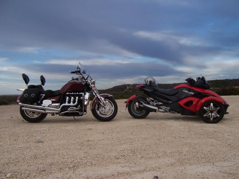 Our toys, my bike and the Mrs.'s Spyder