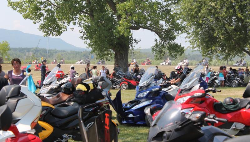 Parade:  look at the Spyders way in the back ground coming back from the parade. I am the first one on the right side of the tree (still on the road).