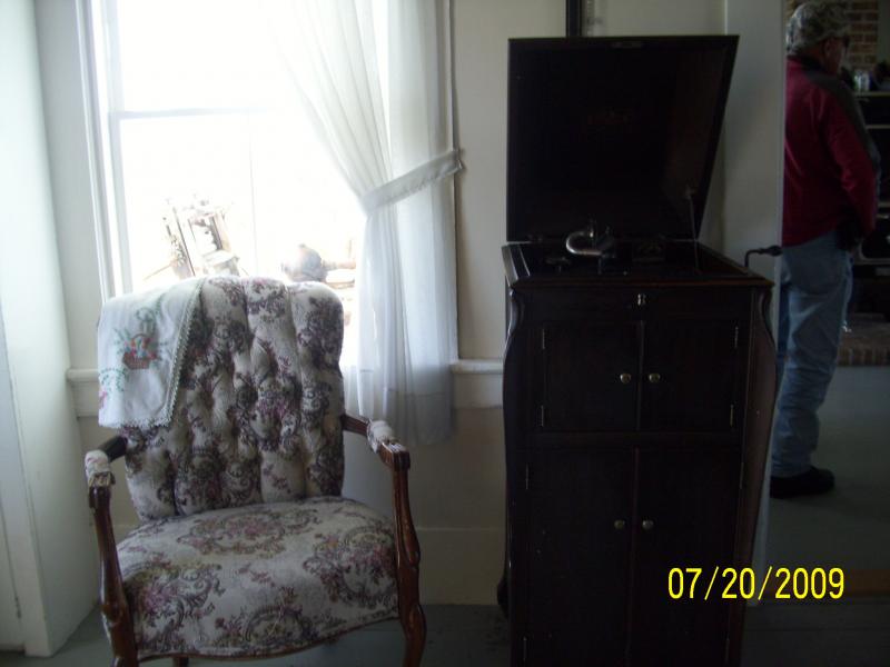 Phonograph and chair.