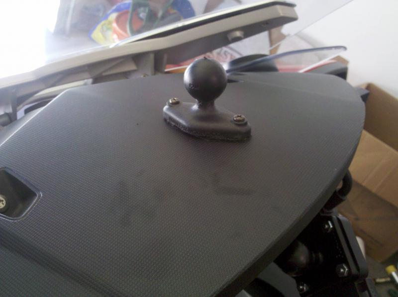 Ram ball mounted to top of dash. I also put heavy duty velcro in between the mount and the dash to help absorb some of the vibration, & it seems to ha