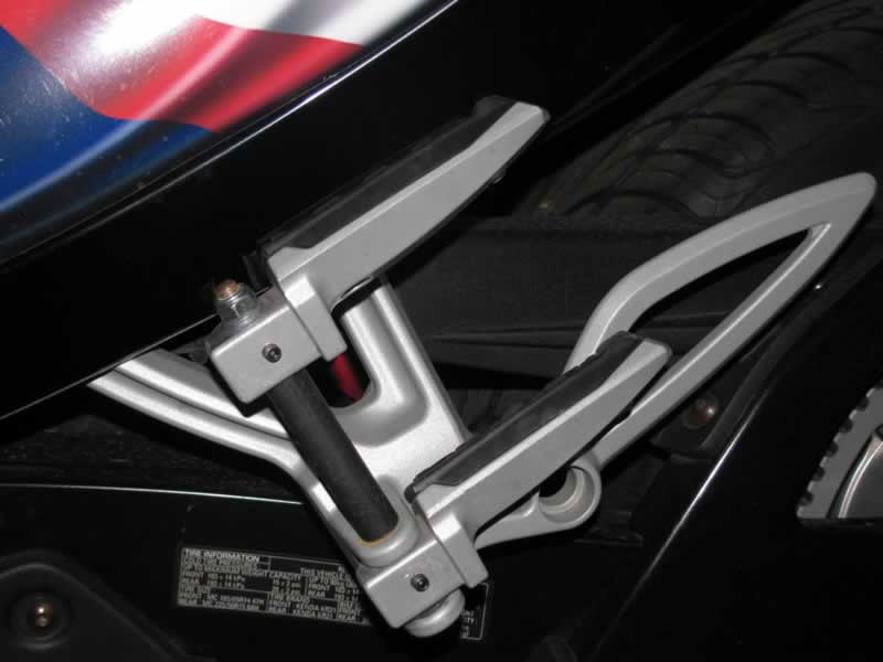 Rear foot pegs in folded back position