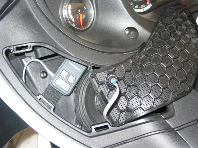 Remote velcro'd within speaker cavity