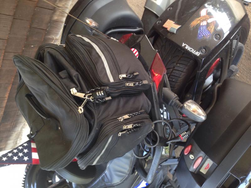 Rivco expandable weather resistant sissybar bag w/cable &luggage locks will fit fair amount of stuff, fyi. Found @ spyderfest'15 rivco is only offerin
