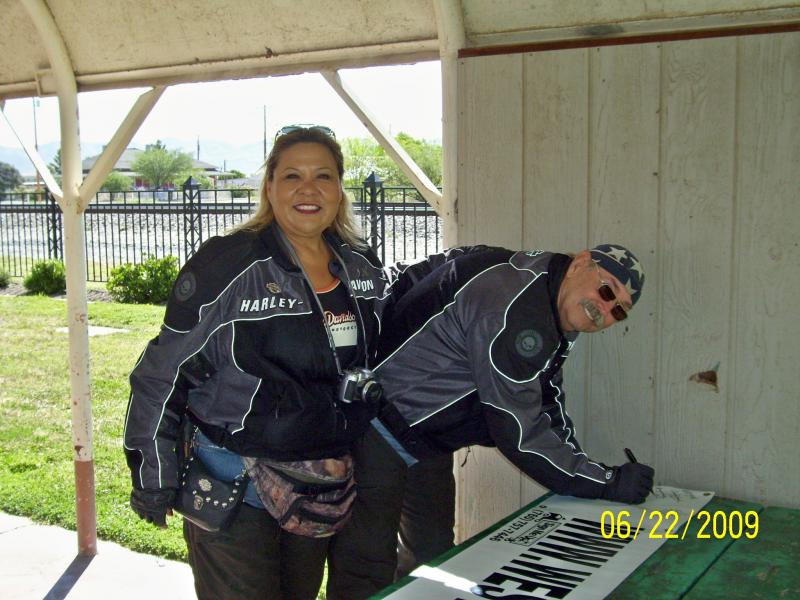 Ruth and Doc signing banner.  They may be Harley riders, but were very impressed with the Spyder.