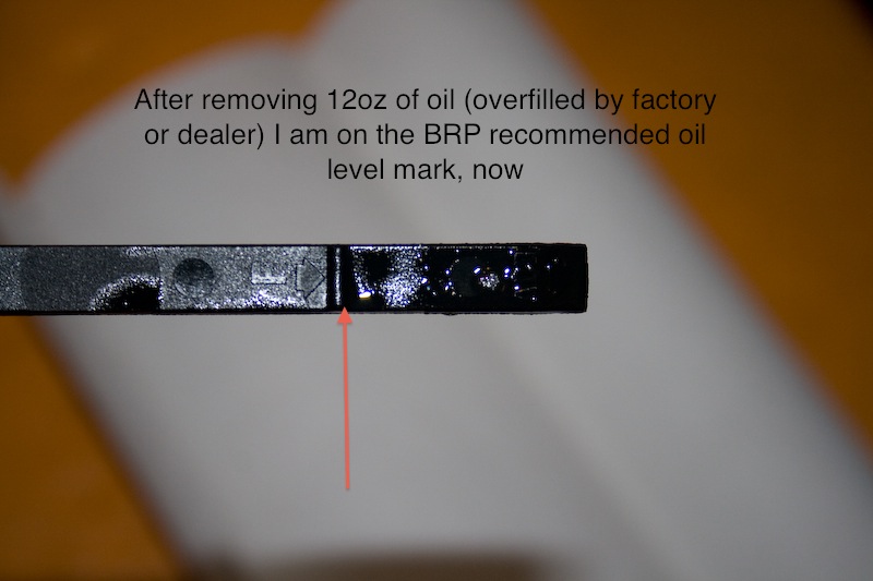 Spyder Dealertoomuchiol 5- After removing 12oz of oil (overfilled by factory or dealer) I am on the BRP recommended oil level mark, now