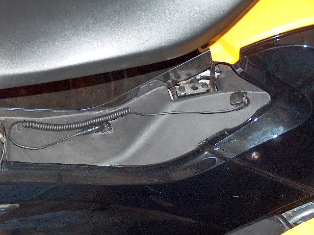 Starcom1 connection, bulkhead mounted under seat, with extension cable to helmet