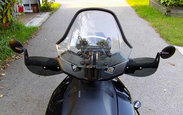 Stock shield but with SaengTa Edging for an extra couple inches of dead air behind the shield. Love the stuff. Also added a pair of cheapie universal 