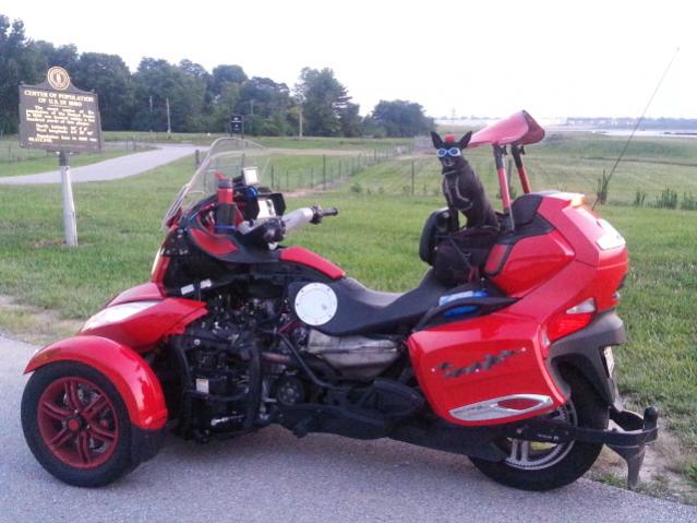 Teddy ryde'n redneck style with a stripped sled at the airport viewing area