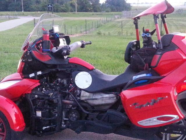 Teddy ryde'n redneck style with a stripped sled at the airport viewing area